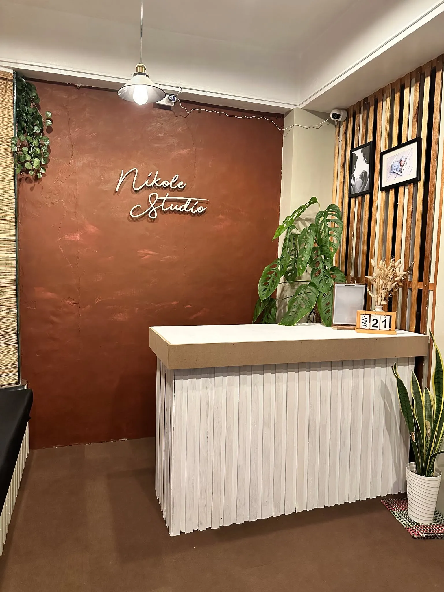 Full studio overview with reception and arched doorway